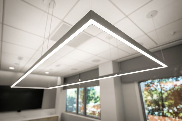 Modern LED rectangular ceiling light fixture in commercial space.